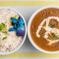 Daal Makhani · Black lentil and kidney beans cooked in a slow, fire, and seasoned with fresh herbs.