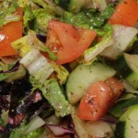 House Salad · Lettuce, tomato, cucumber, green pepper, red cabbage, lemon, and olive oil.