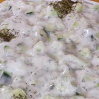 Cucumber Yogurt Salad · Cucumber, yogurt, mint, and garlic.