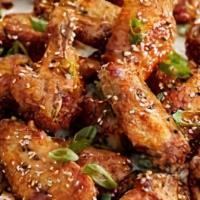 Chicken Wings · 7 piezas de alitas, zanahoria y apio con salsa ranch