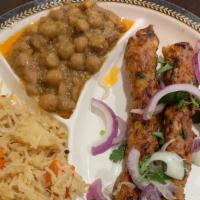 Chicken Seekh Kabob · With grated onions and special seasoning cooked in tandoor on a skewer. Served with nan, rai...