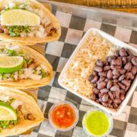 3 Tacos Al Pastor · Grilled pork and pineapple street taco. Includes rice and beans.