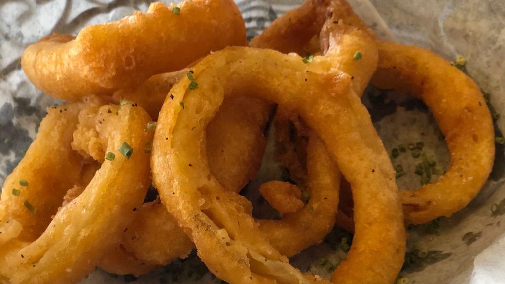 House Battered Onion Rings · Onions freshly coated with beer batter and served with ranch