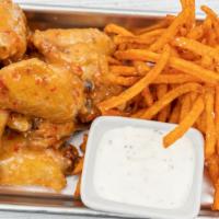 Homestyle Fried Wings · Specialty marinated breaded wings served with fries or sweet potato fries.