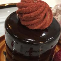 Caramel Chocolate · Chocolate cake with caramel ganache topped with chocolate glaze.