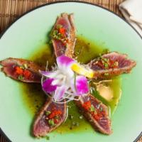 Tuna Tataki · 8 pcs of thinly sliced tuna in ponzu sauce.