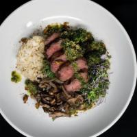 Keto Bowl · Wood-grilled Angus beef Sirloin served over a hearty mix of cauliflower “rice”, garlic-roast...