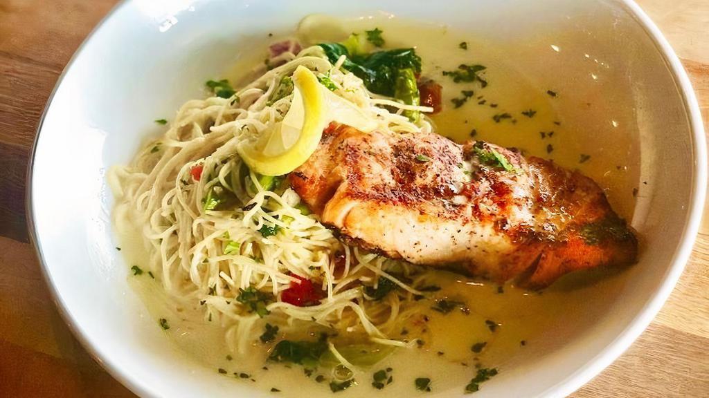 Grilled Salmon Pasta · Grilled salmon served over angel hair pasta tossed in white wine sauce with asparagus, roasted red pepper, and spinach, drizzled with lemon beurre blanc.