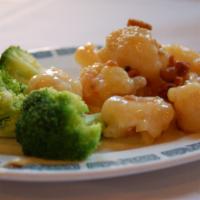 Walnut Shrimp · Small dish - dim sum. Breaded shrimp coated with a sweet, mayonnaise sauce topped with walnu...