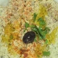 Baba Ghanoush · Eggplant dip made from roasted or grilled eggplant, tahini, olive oil, lemon juice, garlic, ...