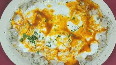 Manti (Ravioli) · Turkish dumpling with yogurt sauce and seasoning