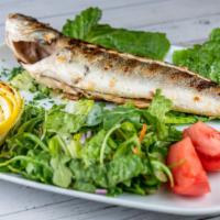 Branzino · Char-grilled Mediterranean seabass served with house salad and special sauce