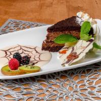 Chocolate Godiva Mousse Cake · Chocolate Cake soaked in Godiva Liqueur and layered with chocolate mousse