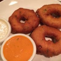 Medhu Vada (3 Pcs) · Lightly crispy lentil donuts served with chutney & sambar.