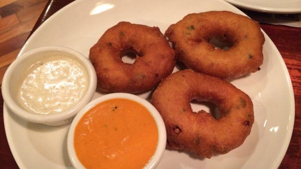 Medhu Vada (3 Pcs) · Lightly crispy lentil donuts served with chutney & sambar.