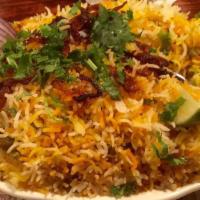Vegetable Dhum Biryani · Vegetables are delightfully cooked with special Basmati rice in a uniquely layered Nawabi st...