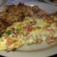 Mediterranean Omelette · Green peppers, onions, tomatoes, mushrooms, Feta cheese, homefries and toast.