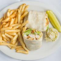 Chicken Caesar Wrap · Grilled Chicken, Romaine, Lettuce, Caesar Dressing, Croutons and Parmesan Cheese.