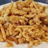 Fried Clam Strips · Served with french fries coleslaw tartar sauce potato and vegetable.