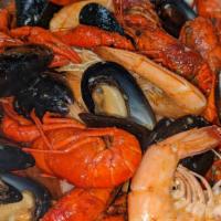 The Popular Package Special · served with 2 LBS of crawfish,1 LBS jumbo shrimp,1LBS of black mussels and 1corn,1 potato,1s...