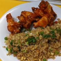 6 Chicken Wings With Fried Rice · 6 wings served with fried rice, carrots, green peas, onions, and small pieces of egg. (On fr...