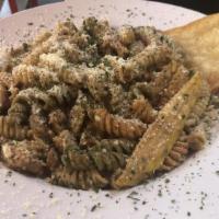 Rasta Pasta · Tri-Colored Rotini, Julienne Vegetables, Herb Coconut Parmesan Cream Sauce. Add protein for ...