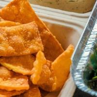 Crab Rangoon Dip · Your favorite takeaway app in dip form, comes with wonton chips