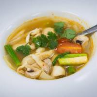 Spicy And Sour Soup · Fresh Thai chili, lemongrass, kaffir leaves, tomato, mushroom, onion, and lime juice. . Tofu...