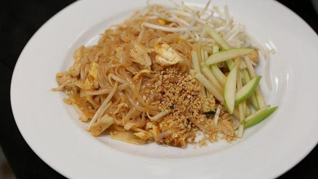 Pad Thai · Stir-fried rice noodle with Pad Thai sauce, egg, bean sprouts, peanuts and green onion. YCOM