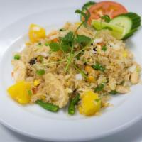 Pineapple Fried Rice · Egg, diced mixed vegetables, pineapple, cashew nut and raisin. YCOM