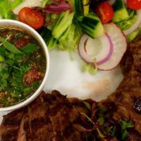Tiger Never Cry · Grilled marinated rib-eye Steak (Choice Grade) in Thai style, served with chili-roasted rice...