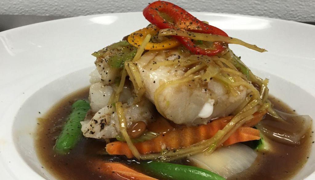 Ds12. Ginger Pacific Cod · Seared pacific wild cod topped with fresh ginger sauce (mushroom, onion, bell pepper, celery).