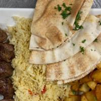 Kabob Platter · Fillet steak kabob cooked over wood burning oven and 2 sides. Small side of hummus and garli...