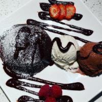 Lava Cake & Ice Cream · Hot chocolate cake with melted fudge and vanilla ice cream.