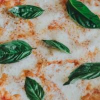 Margherita Pizza · tomato sauce, housemade mozzarella, basil