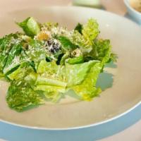 Caesar · Romaine lettuce, parmesan, olives, croutons, tonnato dressing.