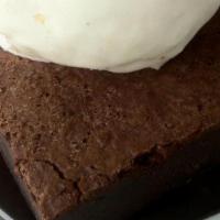 Brownie A La Mode · dark chocolate brownie, candied walnuts,  tahitian vanilla bean ice cream, dark chocolate sa...