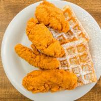 Chicken & Waffles · Two Belgian waffles topped with boneless fried chicken.