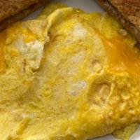 Classic Cheese Omelet · Made with three eggs and American Cheese. Served with your choice of grits or home fries and...
