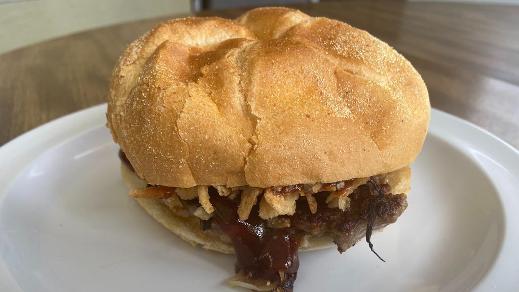 Turnpike Burger · Cheddar cheese, barbeque sauce, and onion crisps. Quarter pound burger on a hard roll.