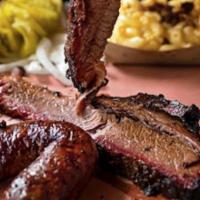 Two Meat Plate · Choose from brisket, sausage, ribs or pulled pork. Includes one side.