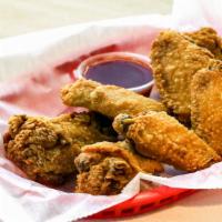 Fried Chicken Wings · Eight Pieces of our 24 hour Brined and Dredged Chicken Wings