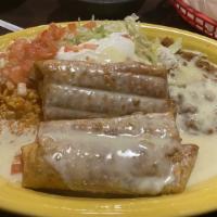 Chimichanga Dinner · Two flour tortillas, fried or soft, filled with shredded beef or chicken, covered with nacho...