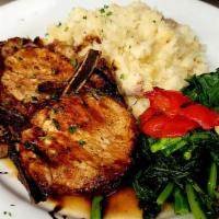 Pork Chops Balsamico · Broiled pork chops served with broccoli rabe, roasted red peppers, garlic mashed potatoes, a...