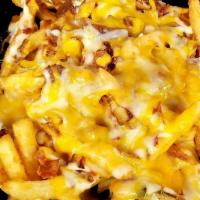 New>Cowboy Fries · crispy fries topped with melted cheese and bacon bits and drizzled with ranch dressing