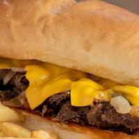 Cheese Steak · On a toasted hoagie roll topped with fried onions served with crispy French fries.