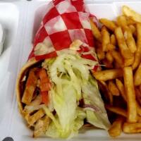 Grilled Chicken Gyro · On toasted pita with lettuce, tomato, onion and homemade tzatziki sauce served with crispy F...