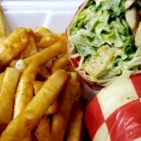 Roman Wrap · Grilled marinated chicken, romaine lettuce, parmesan cheese and seasoned croutons tossed wit...