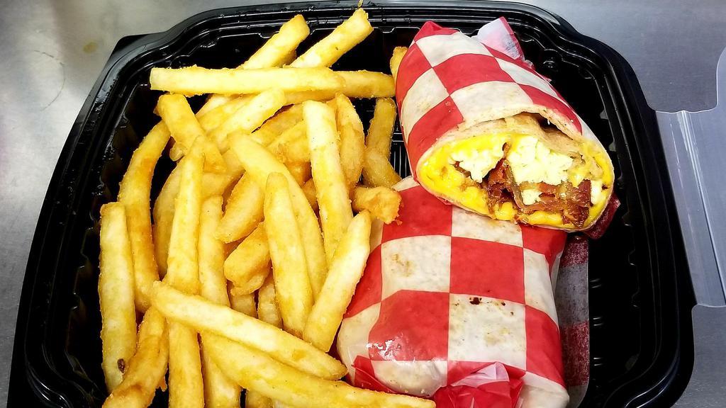 The Breakfast Wrap · Scrambled eggs with your choice of meat and melted American Cheese.