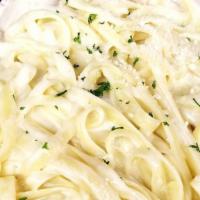 Chicken Alfredo · Sauteed chicken tossed with fettuccine and our homemade cream sauce